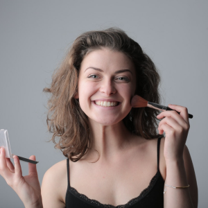 Woman Applying Makeup on face